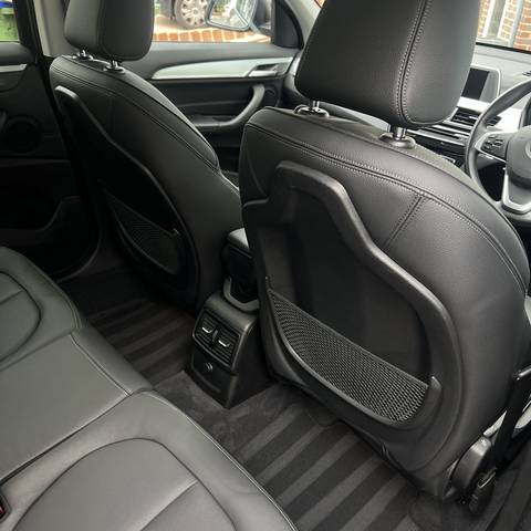 Spotless BMW rear seats and carpets after an interior deep clean