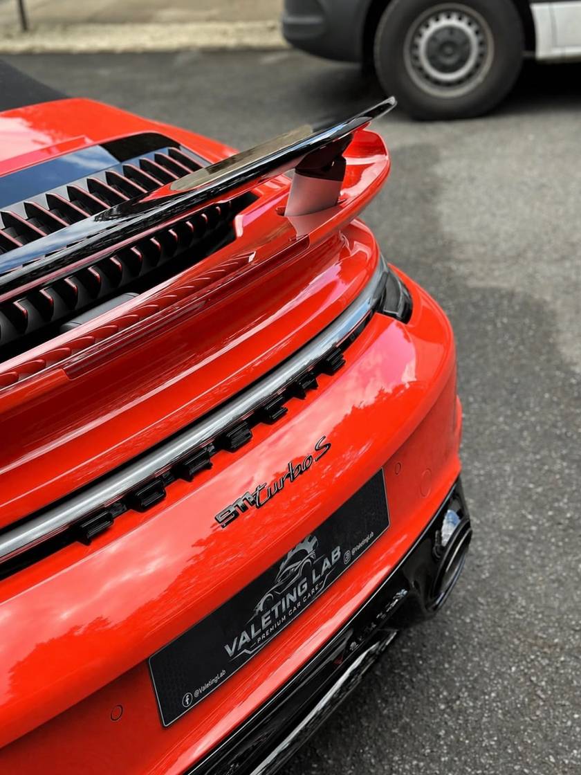 Deep gloss on the rear of a Guards Red Porsche 911 after a valet by Valeting Lab